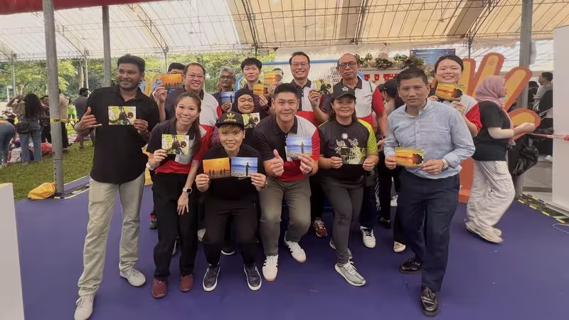 SingPost celebrates International Migrants Day